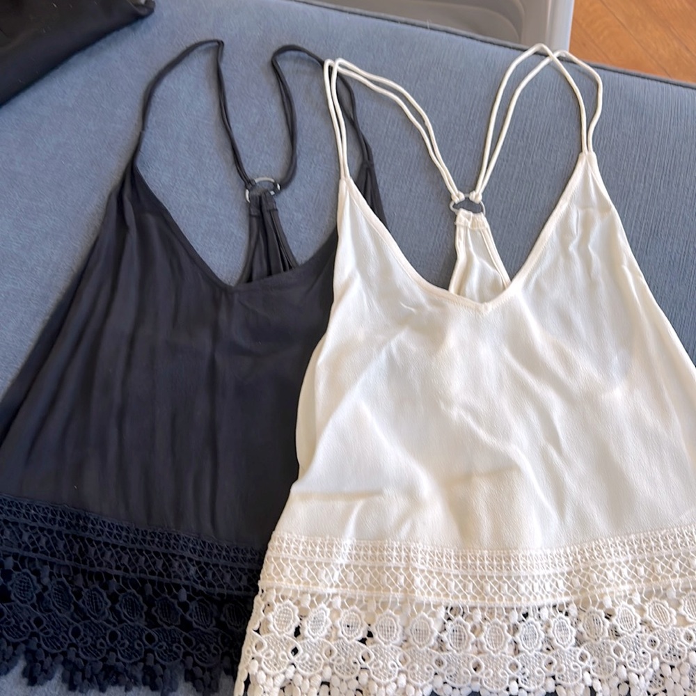 ecote size small racer back tanks in black and off white